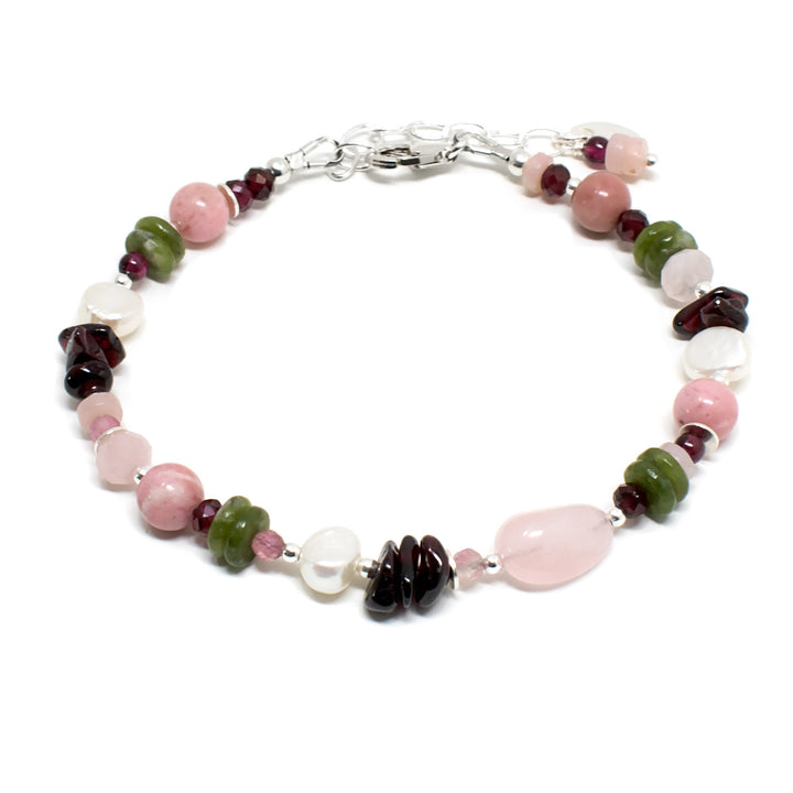 Handmade beaded bracelet with pink and green gemstone beads.